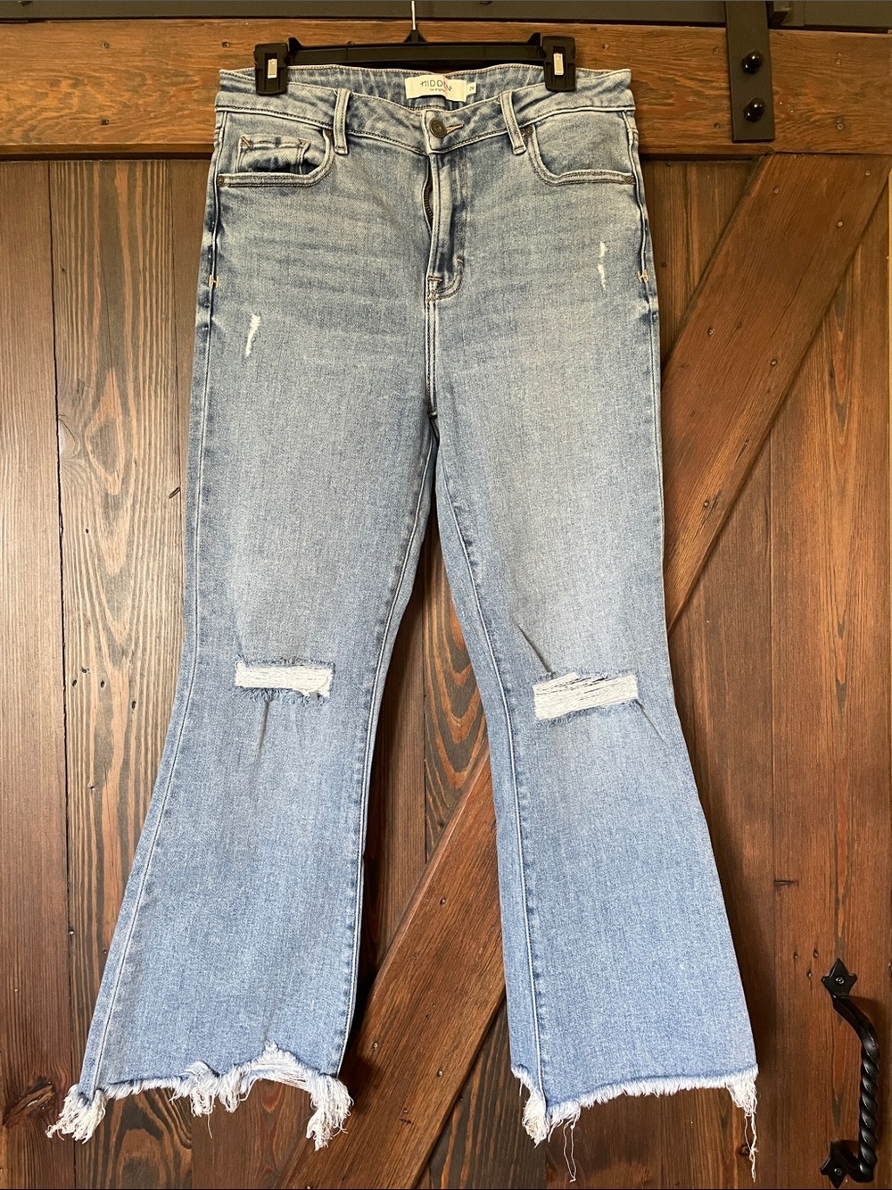 Hidden High-Rise Distressed Flare Jeans in Light Blue